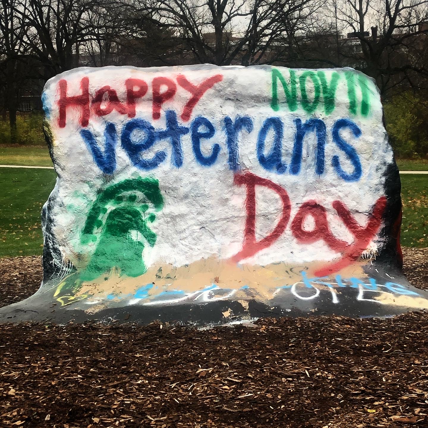 MSU Rock painted to say Happy Veterans Day.