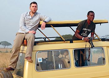 Robert Montgomery and students scout for wildlife in Ghana