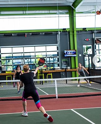 Group playing pickleball