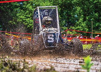 MSU's baja racing vehicle tackles a muddy racing course