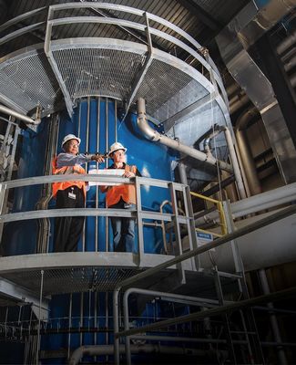 Scientists stand within the FRIB facility 