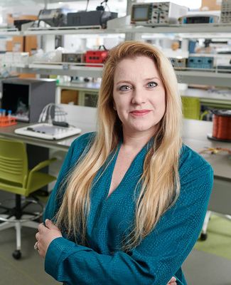 Professor Galit Pelled poses in her lab