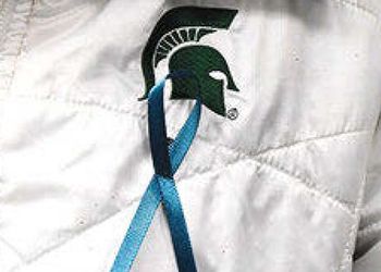 teal ribbon on jacket with Spartan Helmet 