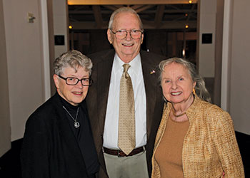 MSU President Lou Anna K. Simon pictured with Fred Addy and Marilyn Addy, dressed up for a special event.