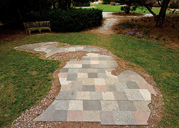 A granite patio in the shape of the state of Michigan.