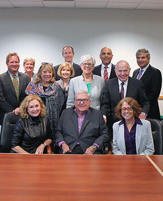 Photo of some of the MSU College of Law Trustees with Richard McLellan in the front, center.