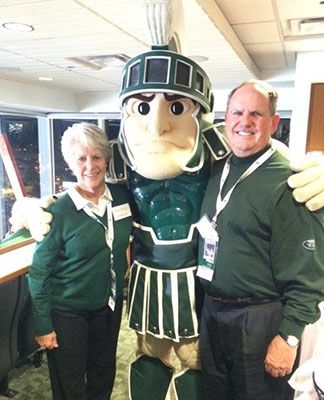 Tim and Karen O'Donovan pose with Sparty