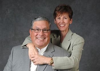 A formal portrait of Bob and Julie Skandalaris