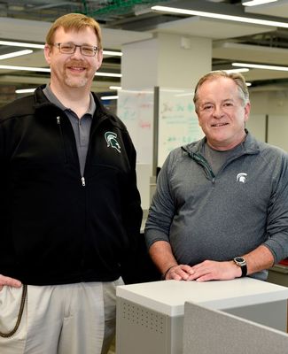 Dr. Andrew Christlieb poses with Raymond Ginther