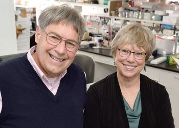 Dan and Karen Friderici pose in a lab