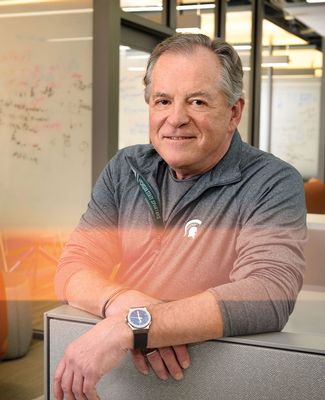 Raymond Ginther poses in the CMSE department headquarters