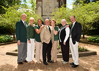 faculty, staff, retiree advisory cabinet in front of beaumont tower