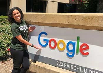 mariah smith poses in front of the sign at Google headquarters