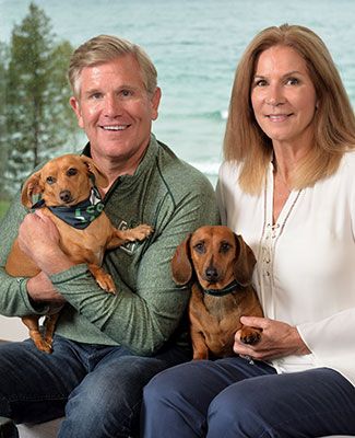 matt and kathleen davis and their two dachshunds bailey and lolas