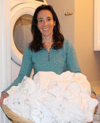 Cyndi Bray with laundry basket