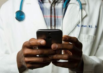 Doctor using smartphone