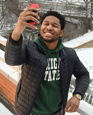 Tim Herd snaps a bird's eye selfie from Erickson Hall