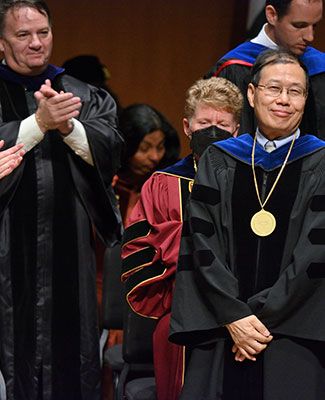 faculty applauding