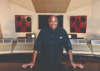 Curtis Daniels III stands in Patchwerk Studios