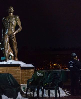 MSU Band members guard Sparty