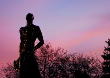 Spartan statue at sunset