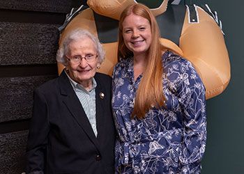 Marge des Lauriers poses with a student who received her scholarship in the College of Education