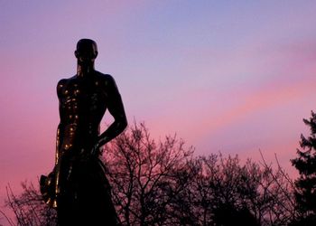 Spartan statue at sunset