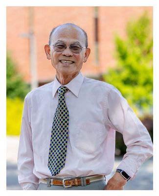 Keelung standing outside on campus