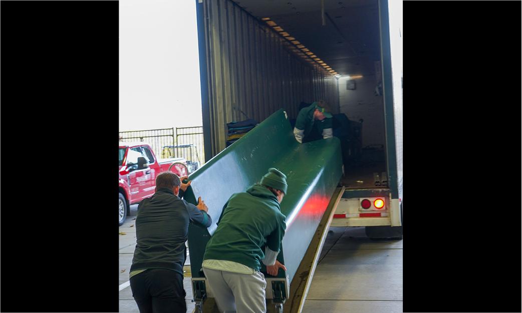 Loading benches to truck