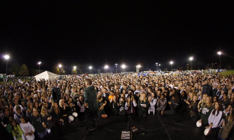 Crowd congregates around stage at Izzone Campout