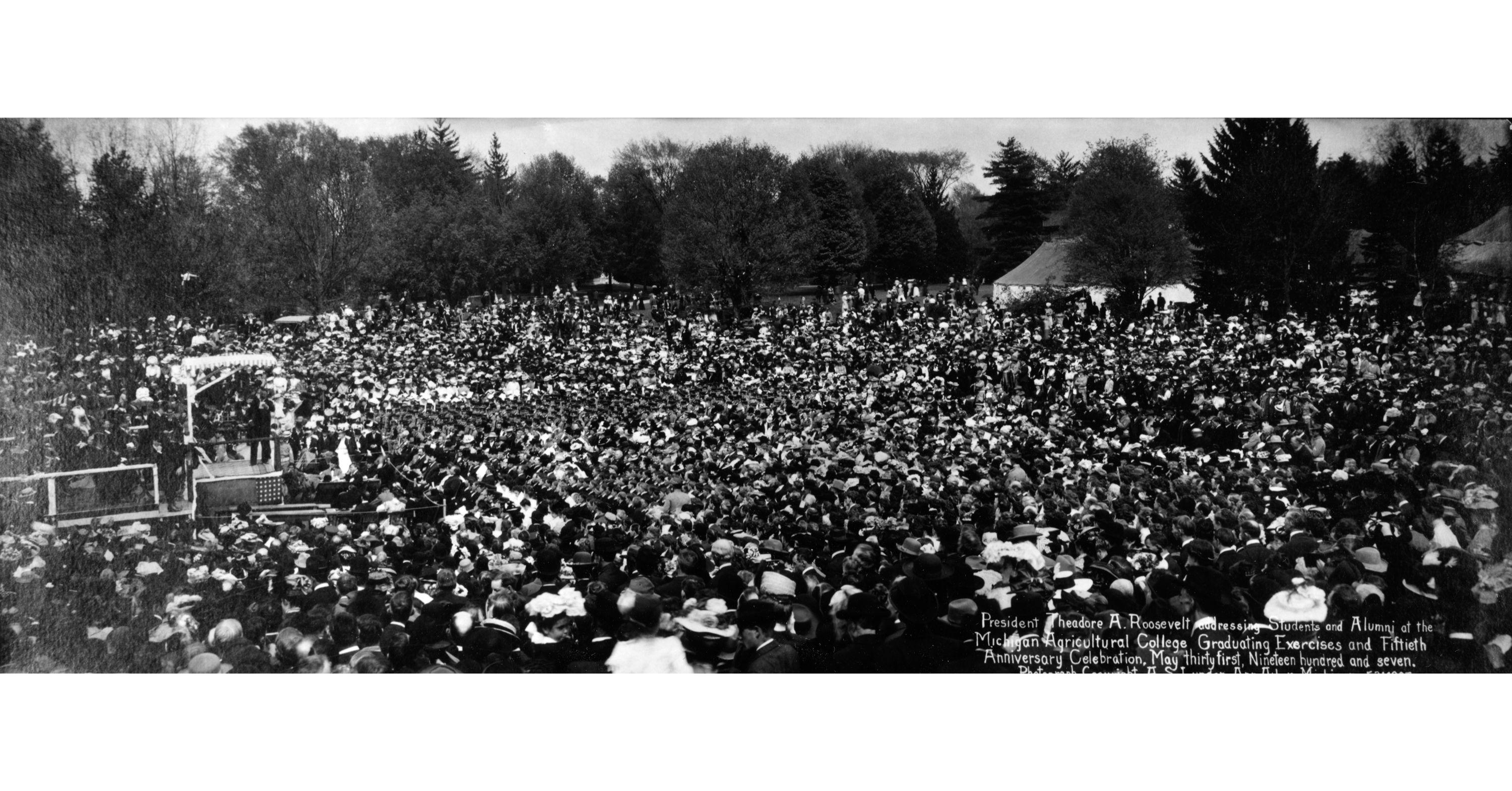 US President Theodore Roosevelt delivers a speech the MSU commencement on May 31, 1907 amid the crowd of people.