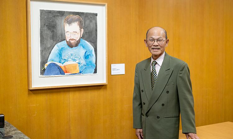 Keelung Hong with watercolor portrait of Stephen O. Murray