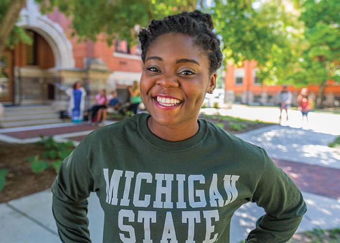 Smiling MSU student on campus.